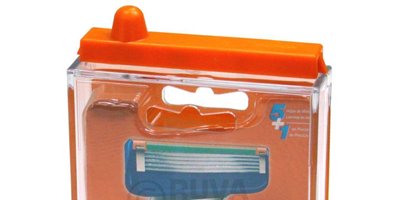 Contenedor antihurto y alarma para cuchillas de afeitar en sistemas antihurtos